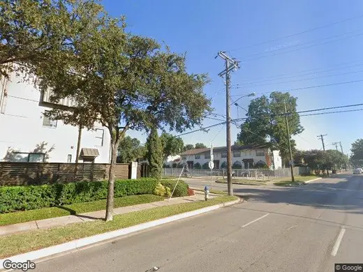 Tree-lined street view of Compass Clinic, a detox center in Dallas.