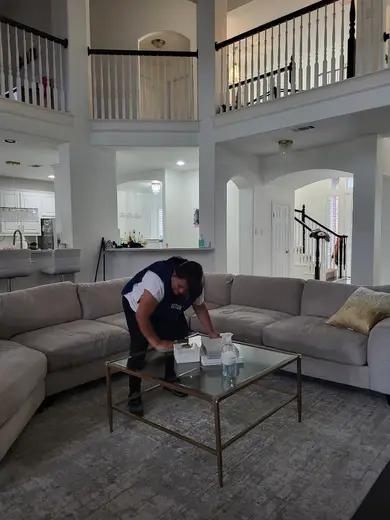 Bright living room with spacious seating at Detox Cleaning Service, a detox center in Dallas.