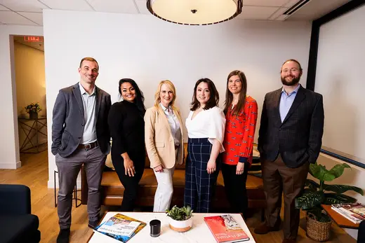 Professional team in modern office at Institute for Relational Recovery, a sober living home in Dallas.