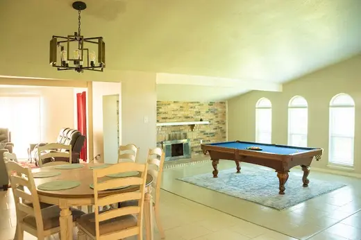 Spacious common area with pool table at Dallas Sober Living Solutions, a sober living home in Dallas.